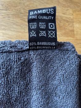 Preview: Tierpflegetuch mit Bambusfaser - Motiv "Tierpfoten" grau